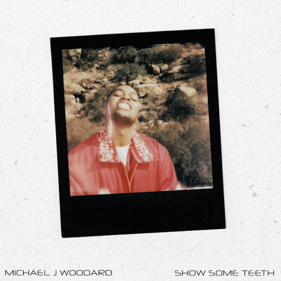show some teeth/Michael J Woodard
