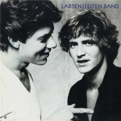 She's Not in Love/Larsen-Feiten Band